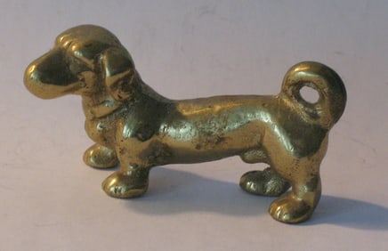 Vintage cast brass Dachshund paper weight.