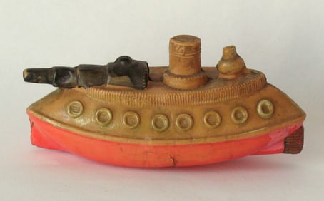 Antique celluloid Gunboat toy.