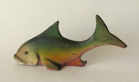 Vintage cast iron fish bottle opener.