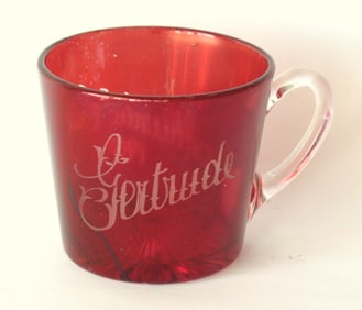 Antique ruby glass souvenir mug for “Gertrude”.