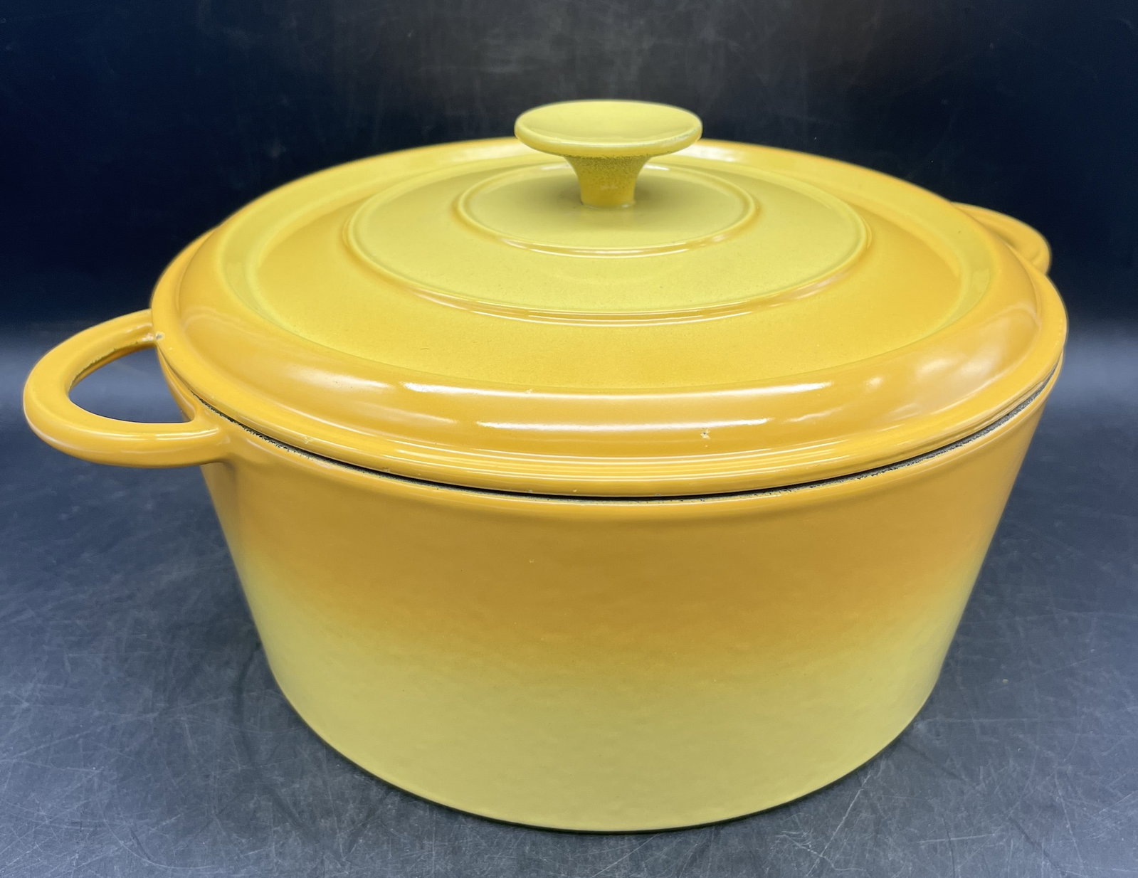 Vintage Yellow Enamel Round Cast Iron Dutch Oven 26 Made In France: Title: Vintage Yellow Enamel Round Cast Iron Dutch Oven 26 Made In France Date/Period: unknown Dimension: Approx. 6.25" tall w lid x 13" x 10" Material: ENAMEL OVER CAST IRON Additional Information: V