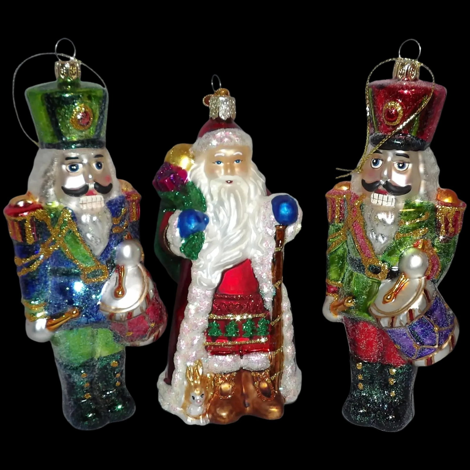 Vintage Glass Santa and Drummers Christmas Ornaments: This trio of Vintage Glass Santa and Drummers Christmas Ornaments are in excellent condition. They stand 6 ¾” with hook attachment. No loss of color or sparkle Shipping: Domestic: Flat-rate