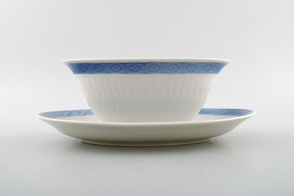 Blue Fan Royal Copenhagen porcelain dinnerware. Oval sauce boat on fixed base, no. 11550. 2 pcs. in