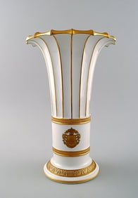Royal Copenhagen vase with gold decoration. Trumpet-shaped.