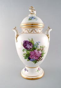 Royal Copenhagen. Antique baluster shaped porcelain lidded vase. Hand painted in colors with
