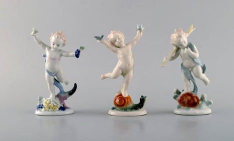 Three Ilmenau porcelain figurines. Dancing boy children. 1970's.