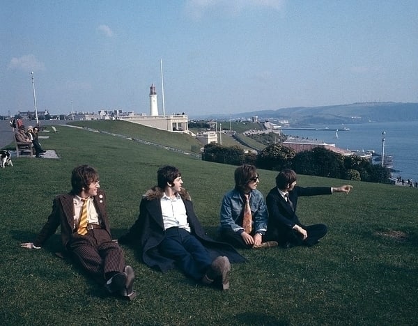 The Beatles On Plymouth Hoe ' By David Redfern Oversized C Type: Description ' The Beatles On Plymouth Hoe ' by David Redfern From left, John Lennon, Paul McCartney, George Harrison and Ringo Starr of English rock group The Beatles sit together on Plymouth Hoe duri