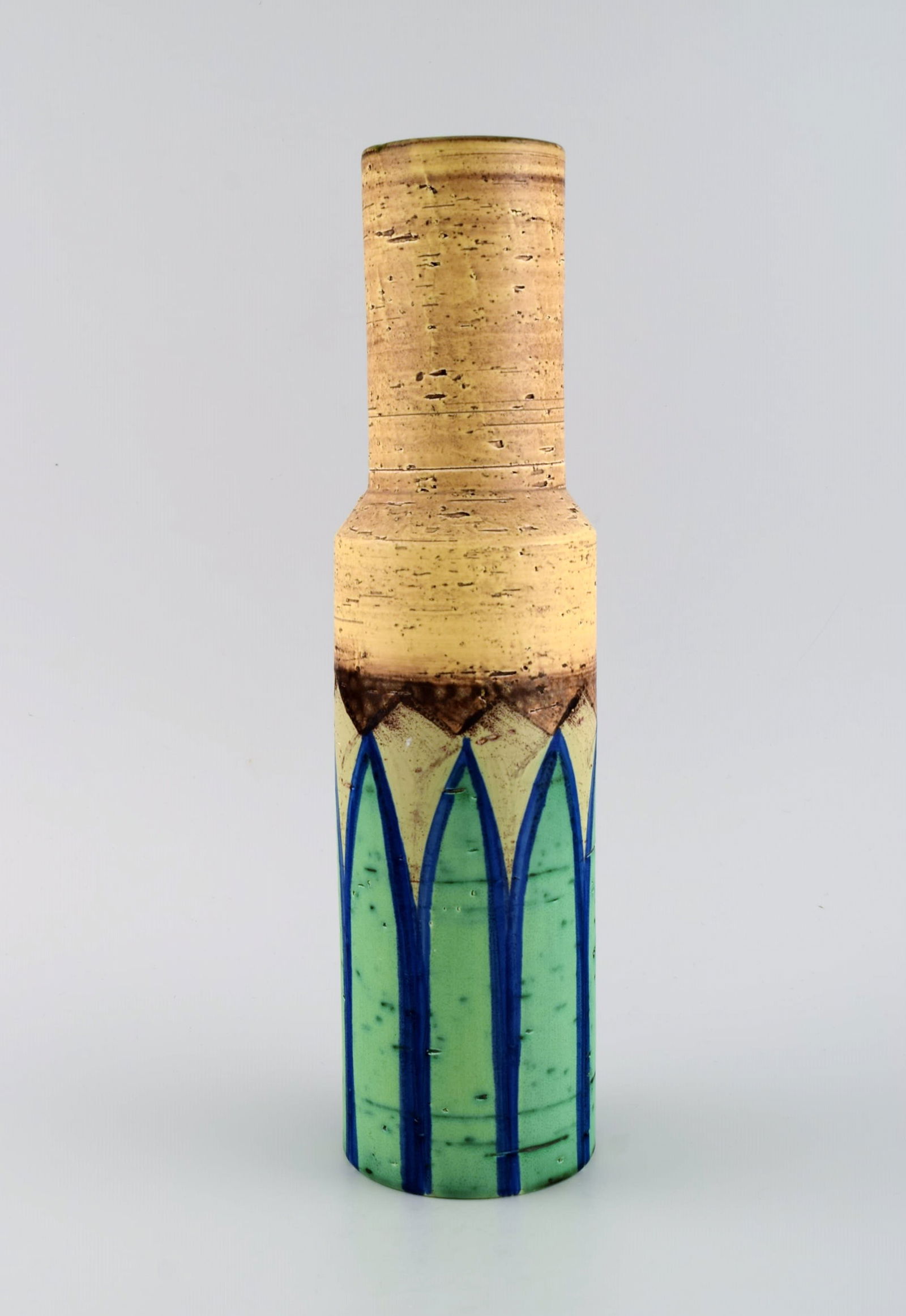 Italian studio ceramicist. Cylindrical vase in glazed stoneware. Hand painted green leaves on yellow (1 of 7)