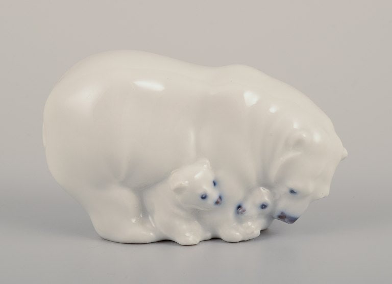 Royal Copenhagen, rare porcelain figurine of a polar bear mother with three cubs.: Royal Copenhagen, rare porcelain figurine of a polar bear mother with three cubs. Model number 4780. Designed by Jeanne Grut. 1960s Stamped. Perfect condition. First factory quality. Dimensions: L 7.5