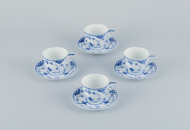 Royal Copenhagen Blue Fluted Half Lace. A set of four coffee cups with saucers.: Royal Copenhagen Blue Fluted Half Lace. A set of four coffee cups with saucers. Model 1/528. Approximately from the 1930s. First factory quality. Perfect condition. Marked. Cup: Diameter 6.5 cm. witho