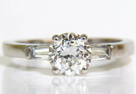 GIA 1.21CT EUROPEAN CUT DIAMOND RING F/VS2 PLATINUM+: ONLY MAGNIFICENT JEWELS 1.01ct. GIA Old European cut diamond F-color Vs-2 clarity. (Please see certificate) Side diamonds: .20ct. G-color, Vs-2 clarity. 14kt. white gold depth of ring: 6.6mm 4 grams t