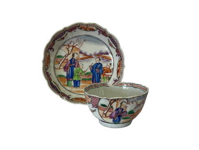 CUP AND SAUCER - INDIA COMPANY - QIANLONG (1736-1795): Made of Chinese export porcelain, decorated with "Rose Family" glazes depicting everyday scenes. Kialong reign (1736–1795). Rim flaw. Reserve: $100.00 Shipping:Domestic: Flat-rate of