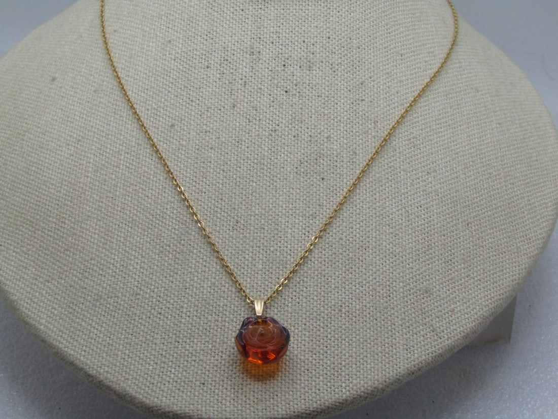 Vintage Amber Rose Blossom Necklace, 18", 1990's: Vintage Amber Rose Blossom Necklace, 18", 1990's. Gold tone chain with spring clasp. Age is appx. 1990's. It is not signed or marked. The chain is appx. 1mm wide and the blossom is a carved design tha
