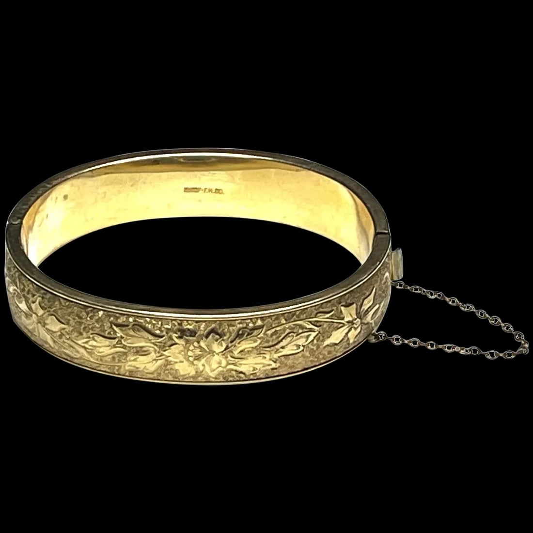 Vintage12K GF F.M. Co. Cuff Bangle Bracelet: Title: Vintage12K GF F.M. Co. Cuff Bangle Bracelet Description: Vintage 12K GF F.M. Co. Cuff Bangle Bracelet Hallmarked: 12K GF F.M. Co. Weighs 17.1 grams Measures Approx. 7-inch circumference Date/Pe