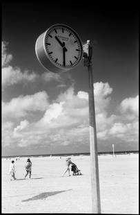 Edition of 10 - 10:30; 2011: Edition of 10 - 10:30, Deauville Beach, France, Silver Gelatin Photograph Edition of 10 + 5 APs. Front: Signature and edition number with artists blind stamp. Back: Ink stamp and print details.