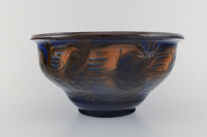 Kähler, Denmark. Bowl in glazed stoneware. Orange foliage on blue background. 1930 / 40s.