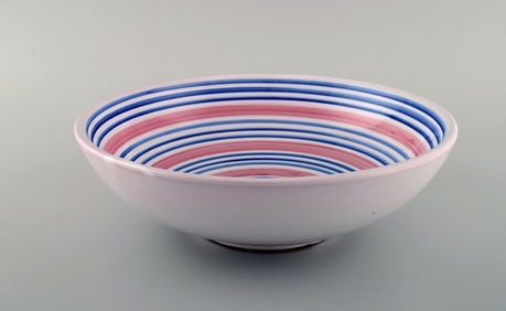 Ingrid Atterberg for Uppsala Ekeby. Large bowl in glazed stoneware. Striped design in blue and pink
