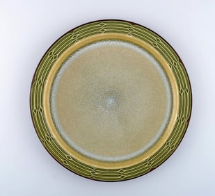 Jens H. Quistgaard (1919-2008) for Bing & Grondahl. Large round "Rune" dish in glazed stoneware. Two