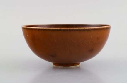 Saxbo bowl in glazed stoneware. Beautiful glaze in brown shades. Mid-20th century.