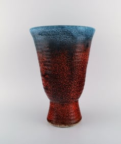 Accolay, France. Large art deco vase in glazed ceramics. Beautiful glaze in red and blue shades.