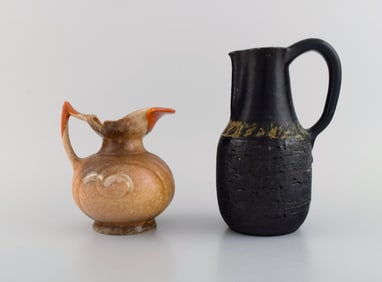 Danish ceramist. Two unique jugs in glazed stoneware. 1960s / 70s.