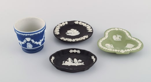 Wedgwood, England. Three bowls / dishes and a vase in black, green and blue stoneware with