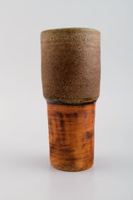 European studio ceramist. Unique vase in glazed ceramics. Beautiful glaze in light brown shades.