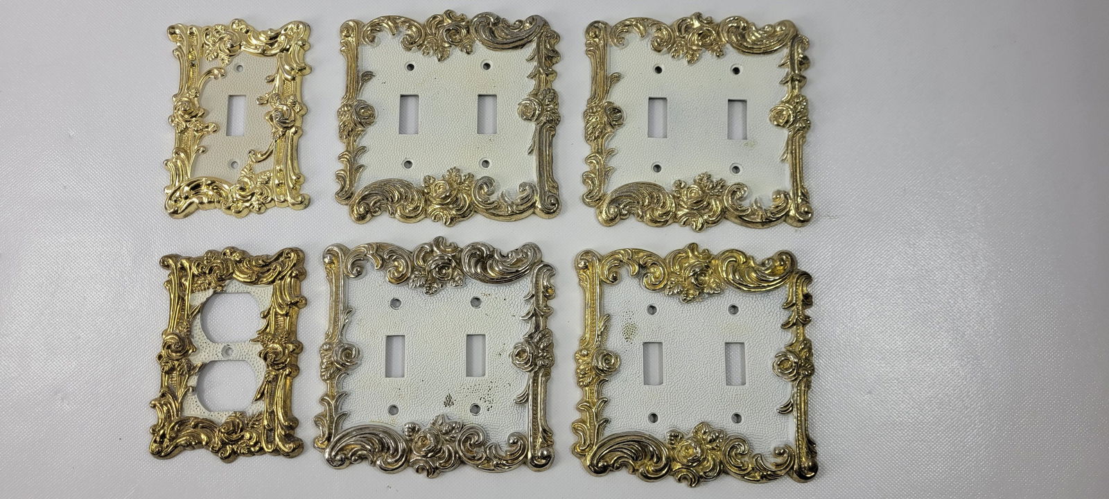 Set of 6 Vintage White & Gold Hardware Socket Cover Receptacle French Design Light Socket Double: Set of 6Vintage White & Gold Hardware Socket Cover Receptacle French Design Light Socket Double Single Beautiful Cover that will be an eye catching detail on your wall. Measures 4 double's 5.25"H x 5.