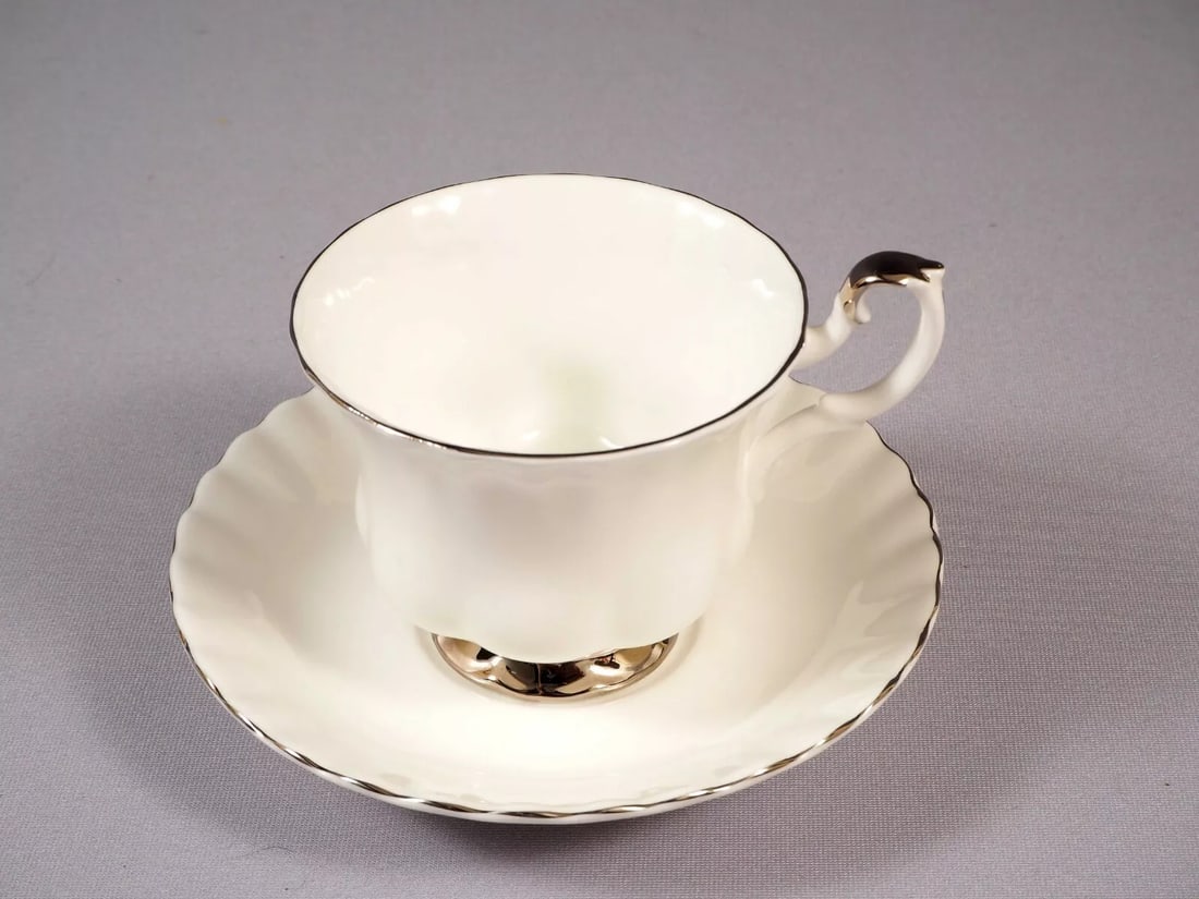 Royal Albert CHANTILLY Coffee Tea Set Cup Saucer Set White Silver Platinum: This is a gorgeous Bone China Tea/Coffee Cup and Saucer set from the famous Chantilly collection by Royal Albert - Made in England. The rims of this pattern with hand-applied bands of platinum rim on