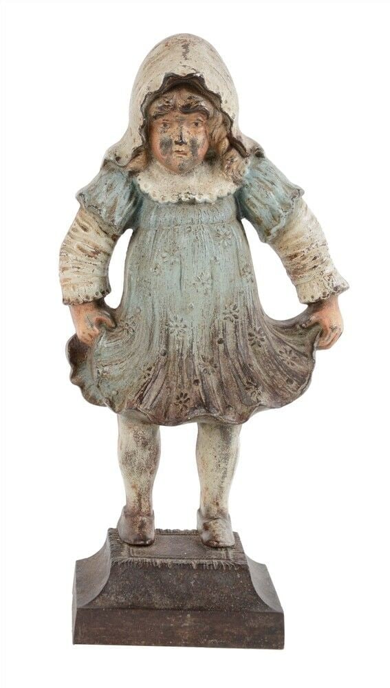 Antique BRADLEY HUBBARD Girl in Bonnet CAST IRON DOORSTOP: Title: Antique BRADLEY HUBBARD Girl in Bonnet CAST IRON DOORSTOP Date/Period: APPROX EARLY 1900's Dimension: 13" TALL Material: cast iron Additional Information: Bradley and Hubbard. Signed "B&H, 7798