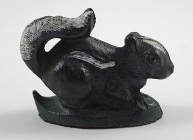 Antique Skunk Cast Iron Bottle Opener