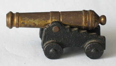 Vintage cast iron & brass canon paper weight.