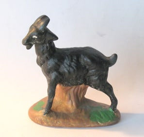 Antique bisque goat figurine.