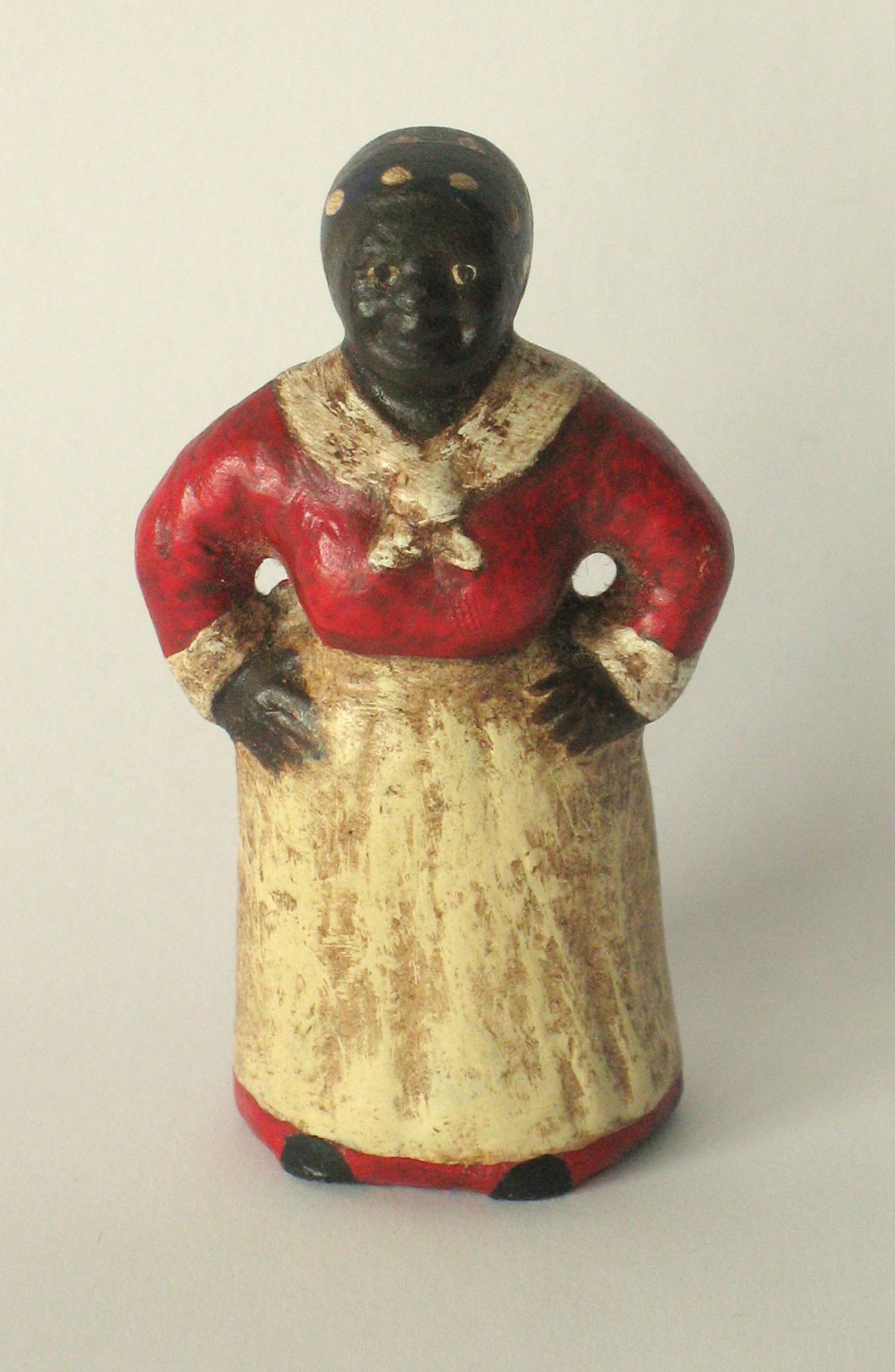 Antique cast lead Mammy paper weight.: Title: Antique cast lead Mammy paper weight. Date/Period: 1920's Dimension: 2 1/2” high Additional Information: Nice antique cast lead Mammy paper weight in great all original paint, patina & co
