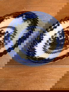Oregon Flow Blue Potato Bowl: It measures 10 7/8” x 2 5/8” and is marked. It has a faint, tight 1” hairline. Otherwise it has no other issues Shipping: Domestic: Flat-rate of $15.00 to anywhere within the contigu