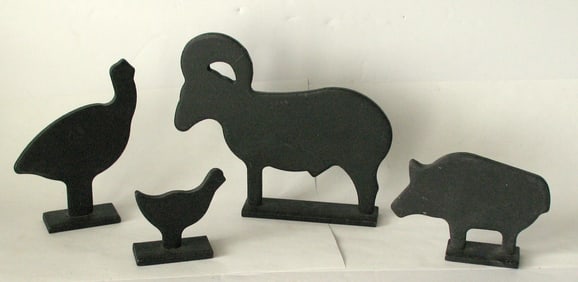Vintage group of iron shooting targets.