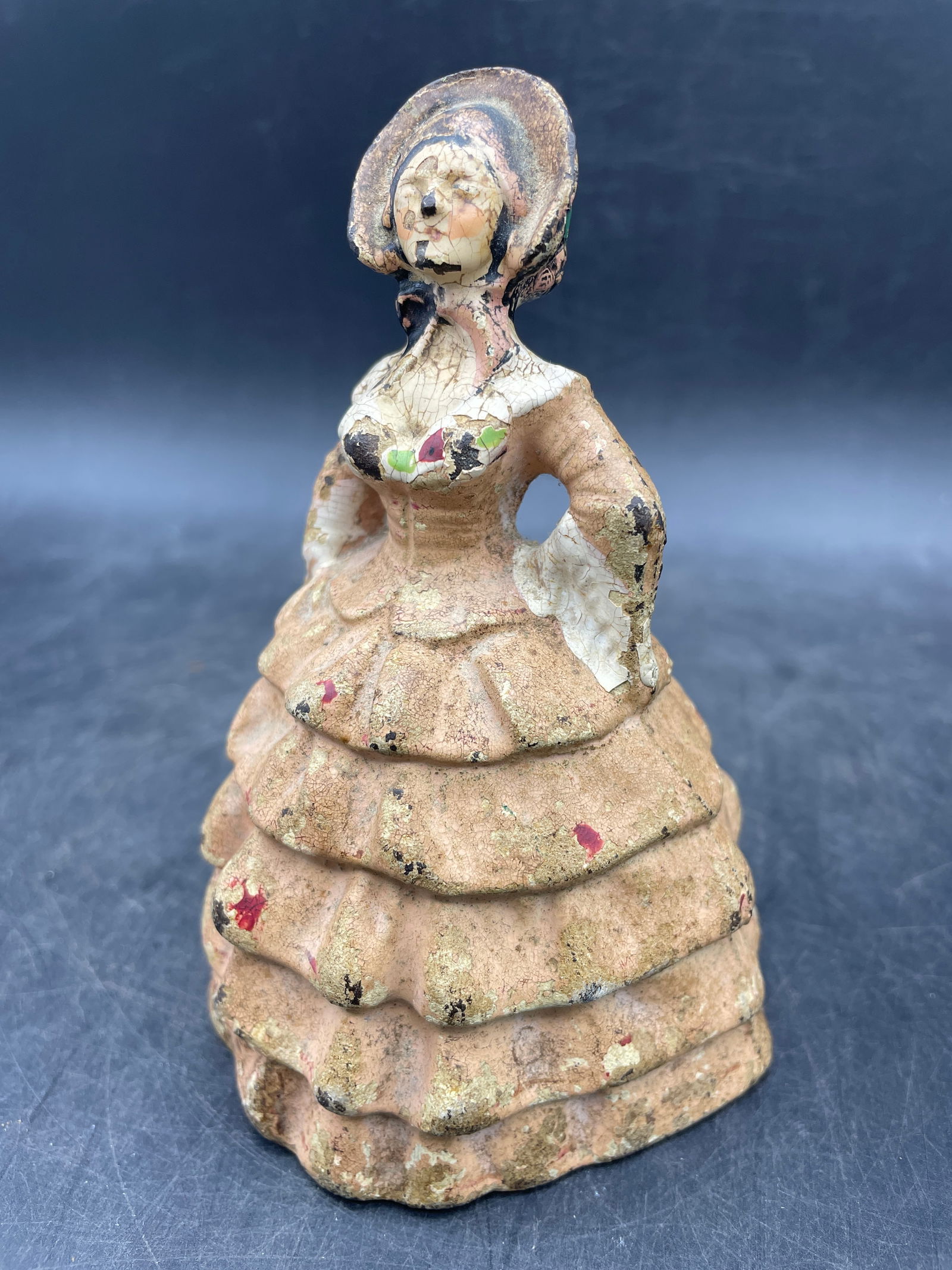 Cast Iron Doorstop Victorian Lady: Title: Cast Iron Doorstop Victorian Lady Date/Period: Dimension: Approx. 4.5 x 3 Material: cast iron Additional Information: Cast Iron Victorian Lady With Bonnet and Pink Frilly Dress Shipping: Domest