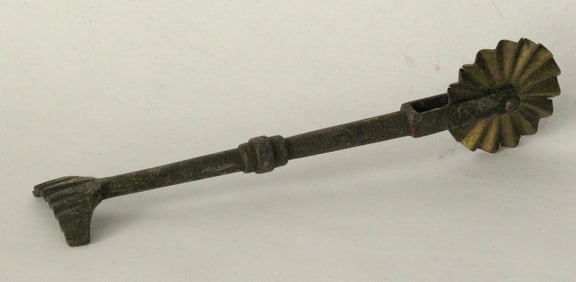 Antique solid brass pie crimper.