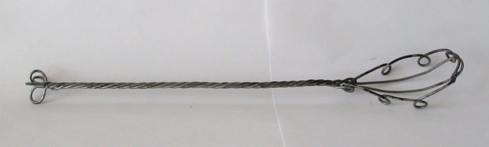 Antique wire country kitchen whisk.
