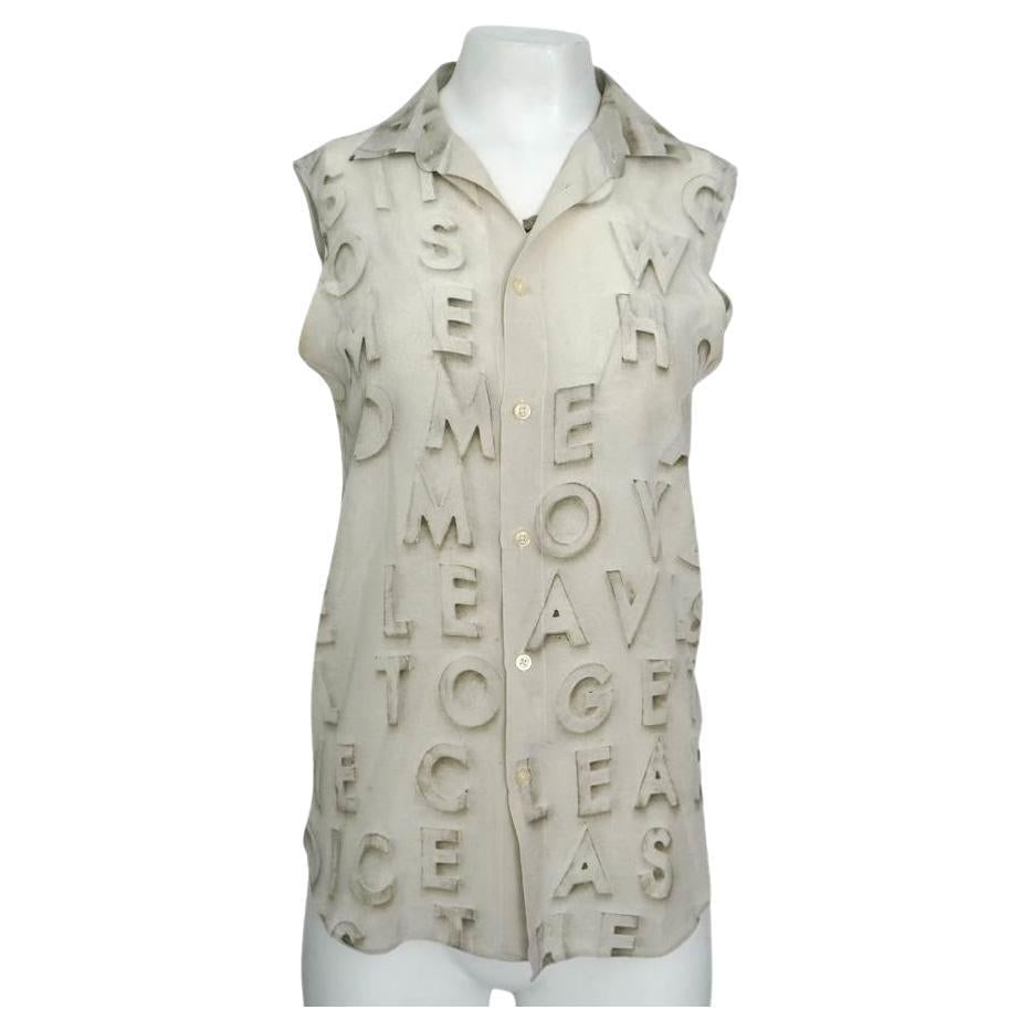 Each x Other Robert Montgomery Silk Blouse XS: About the Item Each x Other Robert Montgomery Silk Sleeveless Blouse Size XS Has small mark on the front of the shirt & armpit marks Bust 34" Length 28" Waist 34' Dimensions: Length: 28 in (71.12 cm)M