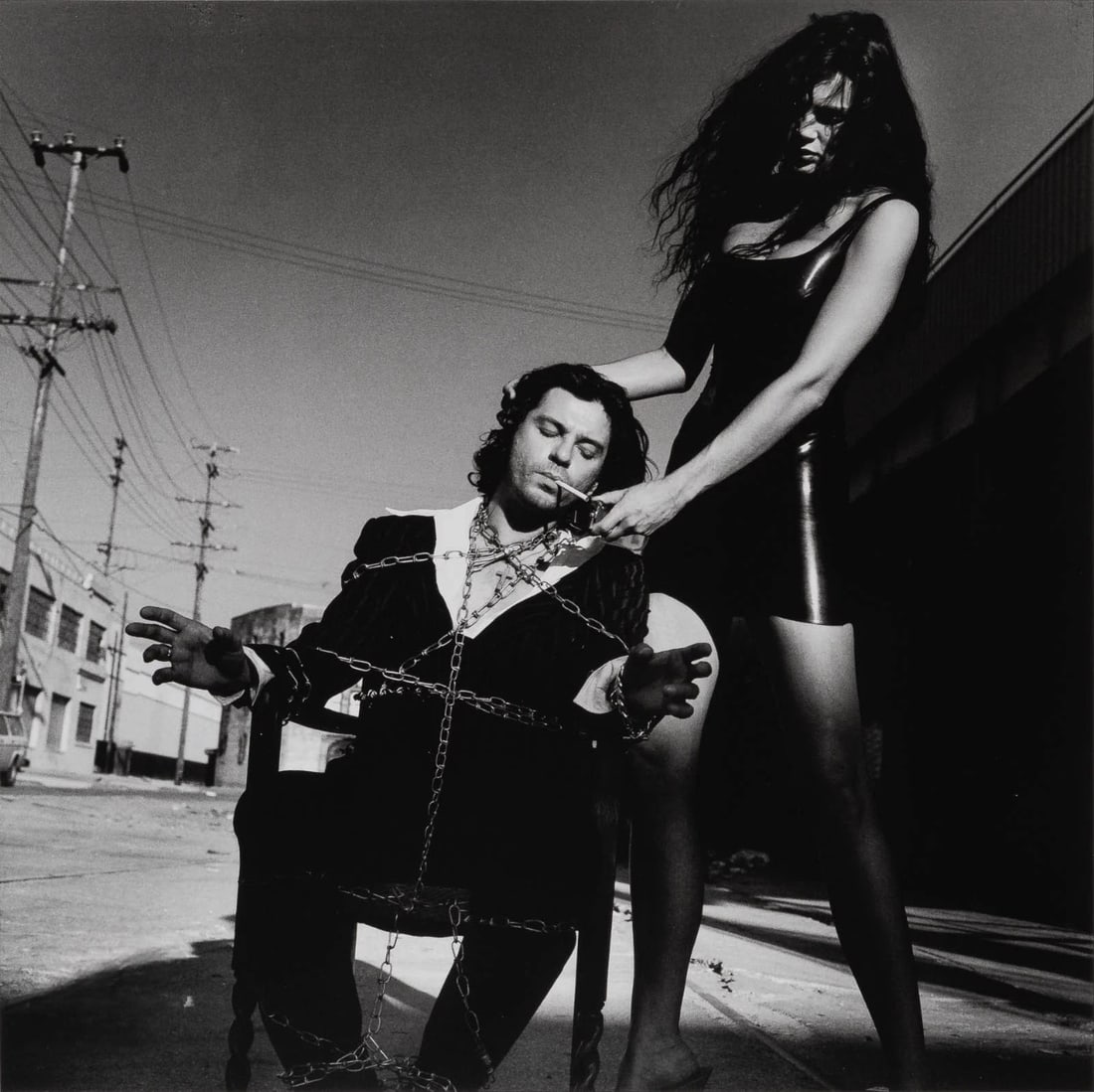 AFTER Helmut Newton 'Michael Hutchins' Print: Title: AFTER Helmut Newton 'Michael Hutchins' Print Description: AFTER Helmut Newton 'Michael Hutchins' Print measuring at 10x10 inches and mounted onto plyboard Date: 1993 Medium: Fine Art Paper & Pl