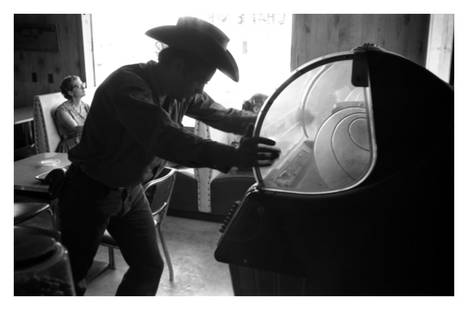 James Dean Filming Giant 12x16" Silver Gelatin Fibre Print: Description James Dean Filming Giant 12x16" Silver Gelatin Fibre Print James Dean picks a song on a juke box in a bar during the filming of the movie “Giant” in Marfa, Texas, 1955.