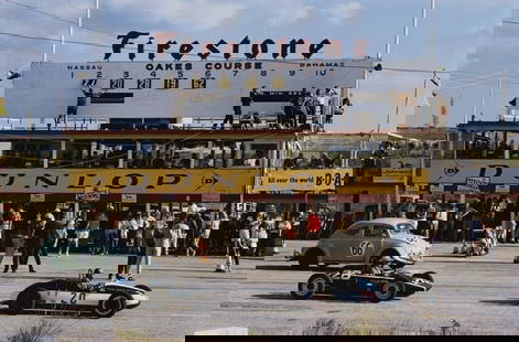 Slim Aarons 'Nassau Speed Week' 1963 Oversize C Type Print Framed In White: Description Slim Aarons 'Nassau Speed Week' 1963 Oversize C Type Print Framed In White Competitors in an assortment of vehicles at the 1963 Nassau Speed Week. (Photo by Slim Aarons) C Type Open