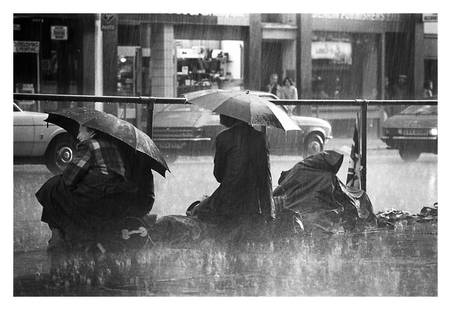 Don’t Rain On My Parade' Homer Sykes Framed In Black: Description Don’t Rain On My Parade by Homer Sykes Onlookers wait in the rain for the Royal procession during the Silver Jubilee, 1977, London, England. frame size - 19 x 23" paper size - 12