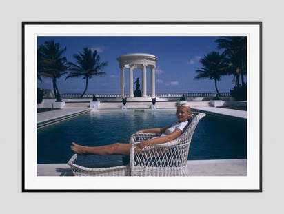 Slim Aarons 'Cz's House' 1955 Oversize Black Frame C Type Print: Description Slim Aarons 'CZ's House' 1955 Oversize Black Frame c type print Mrs F C Winston Guest (1920 – 2003) (aka Cee Zee Guest) reclines on a garden chair in front of the Grecian temple