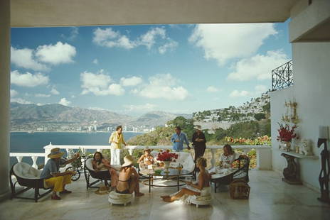Guests At Villa Nirvana ' By Slim Aarons Oversized C Type: Description ' Guests At Villa Nirvana ' by Slim Aarons Guests at the Villa Nirvana, owned by Oscar Obregon, in Las Brisas, Acapulco, Mexico, 1978. (Photo by Slim Aarons/Hulton Archive/Getty