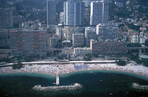 Monte Carlo ' By Slim Aarons Oversized C Type: Description ' Monte Carlo ' by Slim Aarons An aerial view of the beach at Monte Carlo, with skyscrapers rising behind, August 1981. (Photo by Slim Aarons/Hulton Archive/Getty Images) Paper size
