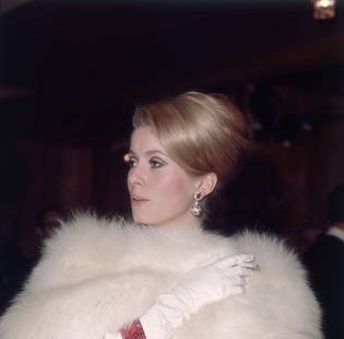 Catherine Deneuve ' By Hulton Archive Oversized C Type: Description ' Catherine Deneuve ' by Hulton Archive French actress Catherine Deneuve arriving at a Royal Film Performance of James H. Hill's movie 'Born Free', at the Odeon, Leicester Square,