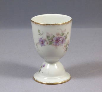 Limoges CH Field Haviland France EGG CUP LARGE Purple Flowers Clematis Vines: This is rare and hard to find LARGE Egg cup. The cup was made in CHField Haviland in Limoges, France. The cup is 2 5/8" in diameter and 4 1/8" deep It will make a wonderful gift or will be a great add