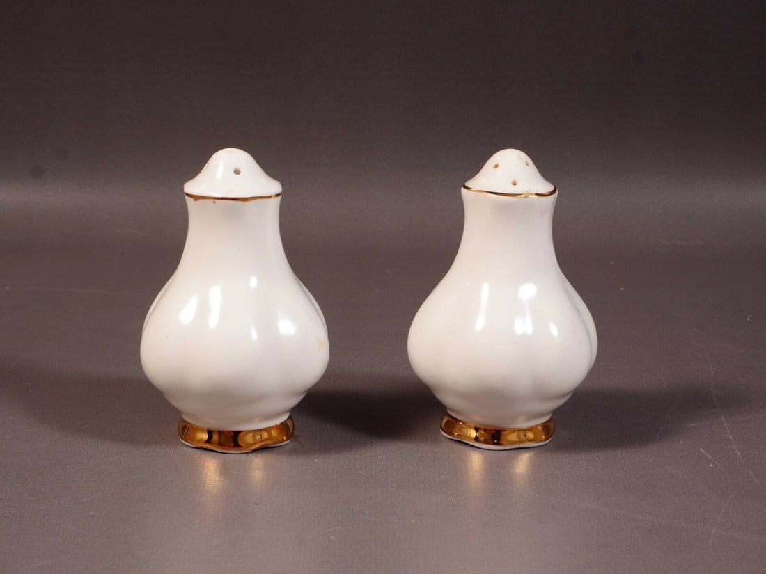 Royal Albert Val D'Or Salt Pepper Shakers set White and GOLD: This is a gorgeous Bone China a set of Salt and Pepper Shakers from the famous Val D'Or collection by Royal Albert - Made in England. The Salt and Pepper Shakers are approx. 3 1/2" tall. The set is in